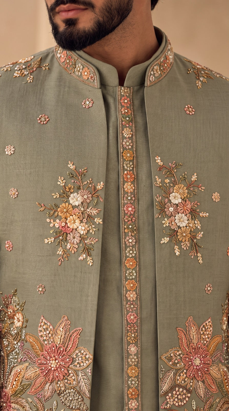 The Sage Garden Prince Coat in sage green with floral embroidery, embroidery detail