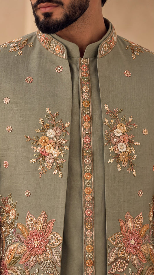 The Sage Garden Prince Coat in sage green with floral embroidery, embroidery detail